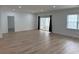 Bright and spacious living room with light wood floors and natural light at 3649 Peachtree Ne Rd # 305, Atlanta, GA 30319