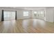 Bright living room features sliding doors and a large window, providing ample natural light and access to an outdoor space at 3649 Peachtree Ne Rd # 305, Atlanta, GA 30319