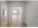 Open concept living space featuring light colored wood floors and white walls at 3649 Peachtree Ne Rd # 305, Atlanta, GA 30319
