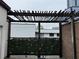Cozy patio featuring a wooden pergola, privacy greenery, and a modern design at 3649 Peachtree Ne Rd # 305, Atlanta, GA 30319