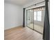 Bright sun room with glass doors and light wood floors, perfect for relaxing at 3649 Peachtree Ne Rd # 305, Atlanta, GA 30319