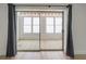 Bright sunroom with tile floors, visible through glass doors with curtains at 3649 Peachtree Ne Rd # 305, Atlanta, GA 30319