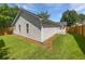 Exterior of a home with a spacious fenced yard at 6795 Browns Mill Walk, Lithonia, GA 30038