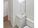 Bathroom featuring a vanity, mirror and toilet at 6795 Browns Mill Walk, Lithonia, GA 30038