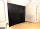 Unfinished basement with black chalkboard and door at 1090 Crown River Pkwy, Mcdonough, GA 30252
