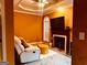 Living room with fireplace and cozy seating area at 1090 Crown River Pkwy, Mcdonough, GA 30252