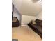 Finished attic living room featuring comfortable seating and carpeted floors at 1090 Crown River Pkwy, Mcdonough, GA 30252
