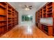 Spacious office or study with built-in bookshelves and hardwood floors at 1090 Crown River Pkwy, Mcdonough, GA 30252