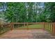 The back deck overlooks the spacious backyard at 1952 Skidmore Cir, Lawrenceville, GA 30044