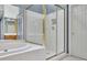 The bathroom includes a shower with glass doors and a separate tub at 1952 Skidmore Cir, Lawrenceville, GA 30044