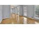 A light and airy foyer showcasing hardwood flooring and a decorative chandelier at 1952 Skidmore Cir, Lawrenceville, GA 30044