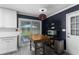 Charming kitchen featuring modern appliances, backyard access, and a butcher block island at 2093 Kolb Ridge Sw Ct, Marietta, GA 30008