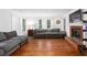 Spacious living room with a fireplace, hardwood floors, and ample natural light at 2093 Kolb Ridge Sw Ct, Marietta, GA 30008