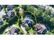 Aerial view of the beautiful home, landscaping, and in-ground pool with hot tub at 2996 Walkin Horse Trl, Buford, GA 30519