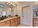 Bathroom with double vanity sinks, granite countertops and tiled floors at 2996 Walkin Horse Trl, Buford, GA 30519