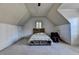 Bedroom featuring light gray carpet, a ceiling fan, and natural light at 2996 Walkin Horse Trl, Buford, GA 30519