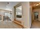 Hallway featuring hardwood stairs and an open view to the living room at 2996 Walkin Horse Trl, Buford, GA 30519