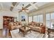 Inviting living room featuring coffered ceilings, classic sofas and an area rug at 2996 Walkin Horse Trl, Buford, GA 30519