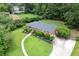 A well-manicured lawn complements this charming brick home with a newer roof at 388 Talcott Nw Cir, Marietta, GA 30064