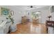 Open living space with a cozy seating area, a bar, and dining area with natural light at 388 Talcott Nw Cir, Marietta, GA 30064