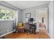 Office space featuring hardwood floors, a large window, desk, and comfortable chair at 388 Talcott Nw Cir, Marietta, GA 30064
