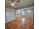 This bedroom boasts hardwood floors, freshly painted walls, and custom built in cabinets at 487 Eastside Dr, Dacula, GA 30019