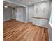 This bedroom has hardwood floors, freshly painted walls, and custom built in cabinets at 487 Eastside Dr, Dacula, GA 30019