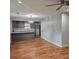 Modern kitchen with gray cabinets, quartz countertops, and hardwood floors, designed for culinary enthusiasts at 487 Eastside Dr, Dacula, GA 30019