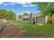 Spacious backyard with a screened porch and fenced-in yard at 1615 Nw Vinebrook Nw Ter, Kennesaw, GA 30144