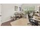 Inviting home office with natural light, a large desk, and neutral tones, perfect for a productive workspace at 1615 Nw Vinebrook Nw Ter, Kennesaw, GA 30144
