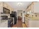 Well-lit kitchen with granite countertops and view of the living room at 1615 Nw Vinebrook Nw Ter, Kennesaw, GA 30144