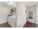 Spacious laundry room with washer and dryer at 1615 Nw Vinebrook Nw Ter, Kennesaw, GA 30144