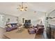 Inviting living room with vaulted ceiling, fireplace, and hardwood floors at 1615 Nw Vinebrook Nw Ter, Kennesaw, GA 30144