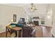Cozy living room with vaulted ceiling, fireplace, and hardwood floors at 1615 Nw Vinebrook Nw Ter, Kennesaw, GA 30144