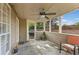 Enclosed porch with tile flooring and a ceiling fan at 1615 Nw Vinebrook Nw Ter, Kennesaw, GA 30144
