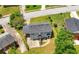 Cozy home with an expansive, well-manicured lawn, mature trees, and a private driveway at 1985 Thomasville Se Dr, Atlanta, GA 30315