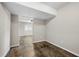 Neutral-colored basement area leading to another room at 1985 Thomasville Se Dr, Atlanta, GA 30315