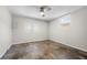 Bright bedroom featuring a ceiling fan and windows at 1985 Thomasville Se Dr, Atlanta, GA 30315
