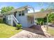 Single Gathering home exterior view shows front entrance stairs and convenient covered parking at 1985 Thomasville Se Dr, Atlanta, GA 30315