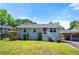 Charming single Gathering home with well-maintained lawn, landscaping, and covered parking at 1985 Thomasville Se Dr, Atlanta, GA 30315