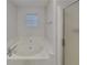 Relaxing bathroom featuring a garden tub and a glass shower stall at 200 Compton Ct, Mcdonough, GA 30252