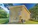 Charming exterior home featuring yellow siding and lush green lawn at 200 Compton Ct, Mcdonough, GA 30252
