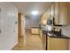 Well-equipped kitchen featuring modern appliances, stylish cabinetry, and sleek countertops for easy meal preparation at 200 Compton Ct, Mcdonough, GA 30252