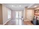 Basement rec room with an outside exit, laminate flooring and neutral paint at 4541 Meadow Club Dr, Suwanee, GA 30024