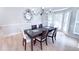 Sunlit dining room featuring modern chandelier and bright light at 4541 Meadow Club Dr, Suwanee, GA 30024