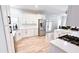 Bright and spacious kitchen featuring stainless steel appliances and white cabinetry at 4541 Meadow Club Dr, Suwanee, GA 30024
