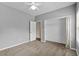 Bedroom with neutral paint, ceiling fan and closet space at 9507 Greens Mill Ct, Loganville, GA 30052