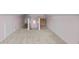Large bonus room with neutral walls and carpet at 9507 Greens Mill Ct, Loganville, GA 30052