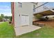 Back of house with a walk out basement and elevated deck at 9507 Greens Mill Ct, Loganville, GA 30052