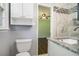 Bathroom with granite countertops and a view to another bathroom and bedroom at 1663 Pounds Sw Rd, Stone Mountain, GA 30087